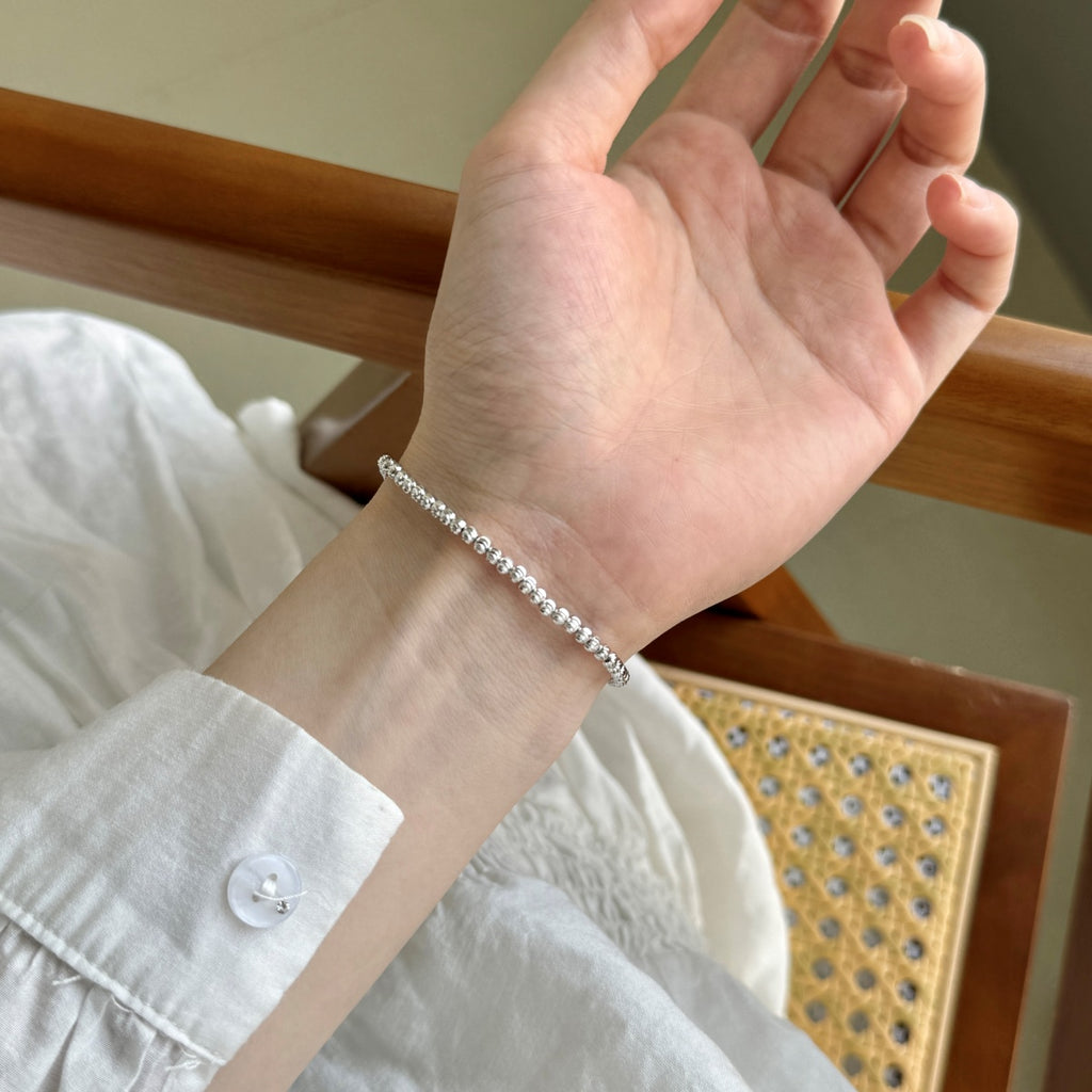 Radiant Silver Bead Bracelet