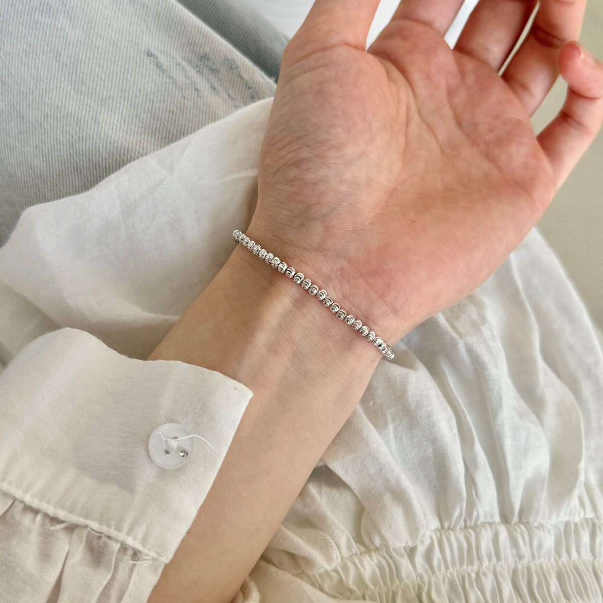Radiant Silver Bead Bracelet